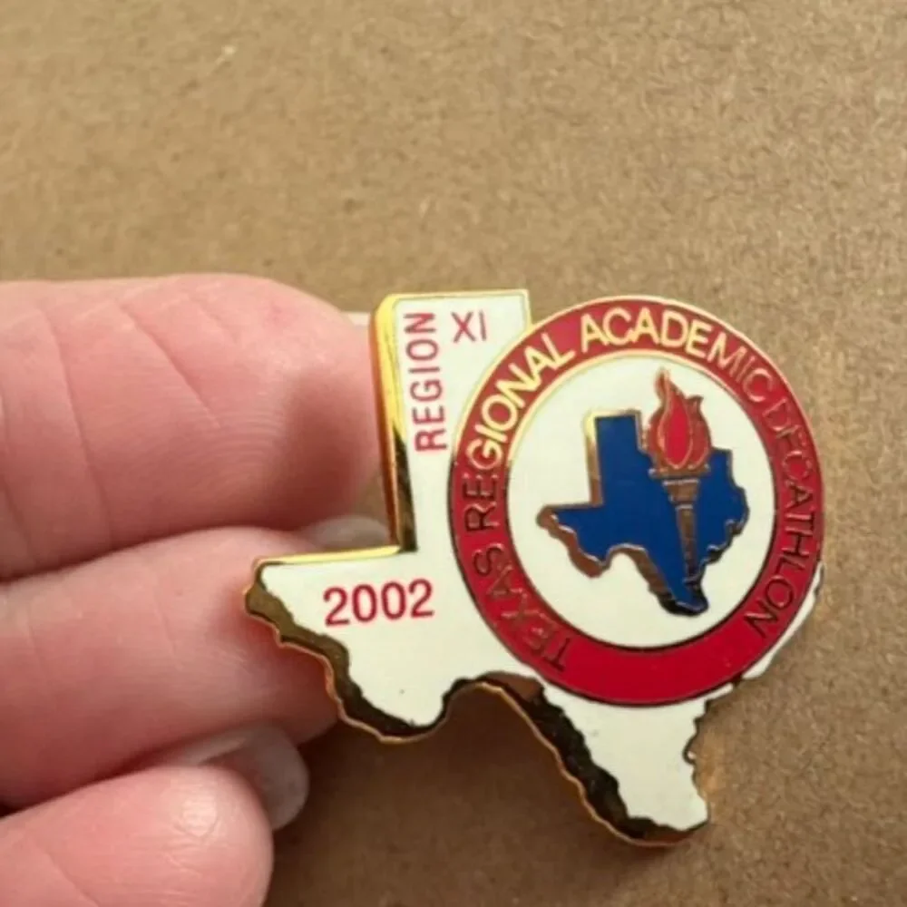 2002 Texas regional academic Decathlon XI enamel pin